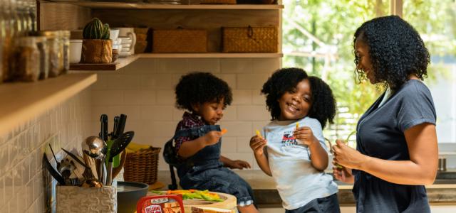 woman in white t-shirt standing beside woman in black and white stripe shirt by Hillshire Farm courtesy of Unsplash.